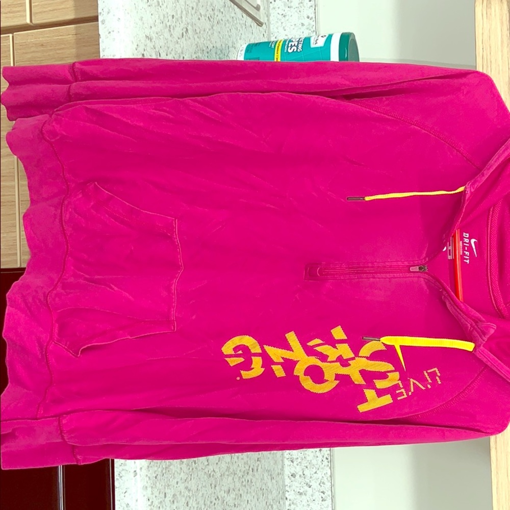 Pink Nike pullover with hood